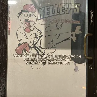 hours of operation posted on side door of restaurant