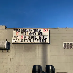 a sign on the side of a building