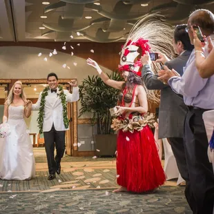 hula greeting at a fun wedding reception. Hawaii Destination Wedding, hawaii wedding photography