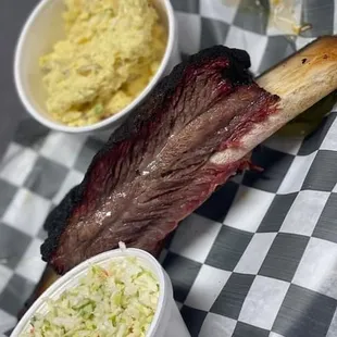 a rack of ribs and coleslaw