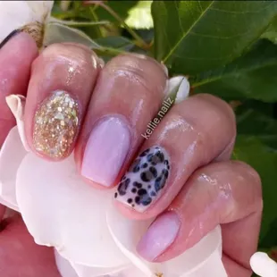 Leopard print nail art.