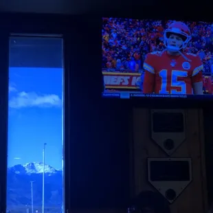 a view of a football game on tv