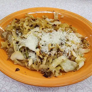a plate of pasta and vegetables