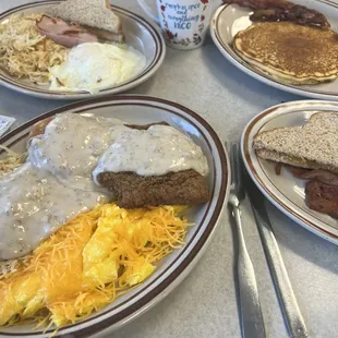Eggs, pancakes, biscuit and gravy, toast.