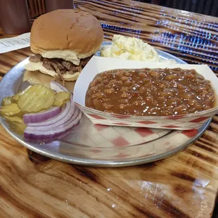 Waygu chopped beef sandwich with the famous baked beans and a homemade potato salad !!