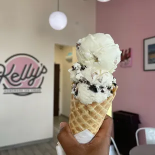 Triple scoop ice cream in a waffle cone