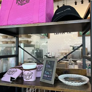 a pink bag on a shelf