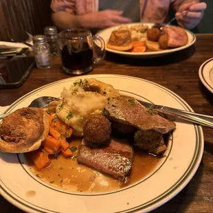 Sunday Roast. My beef was tough but everything else was good.