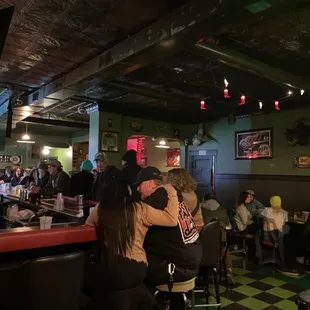 people sitting at the bar