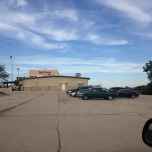 Right next to the ballpark tucked away from the road
