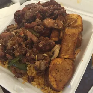 Spicy bourbon chicken with rice and potatoes