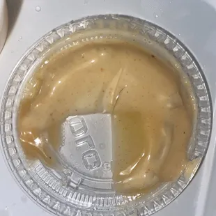 Here you see the Yum Yum sauce and there's a black strand of hair in the sauce.