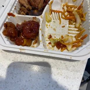 Noodle, honey chicken and something else.