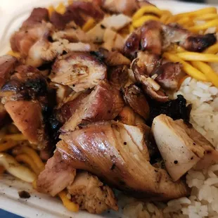 a plate of chicken and rice