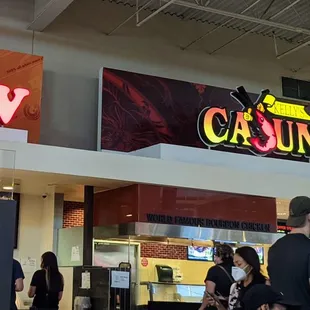 a crowd of people at the counter