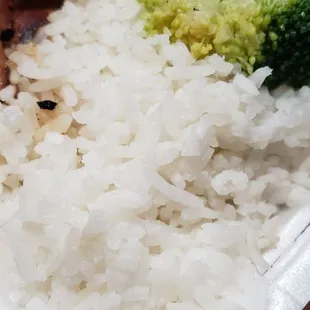 Close up rice from Bourbon Chicken with rice and veggies