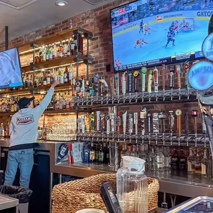 a bartender at the bar