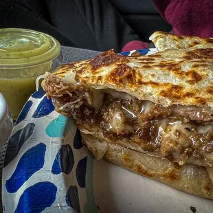 Carne asada quesadilla, crispy On the outside and juicy on the inside.