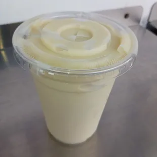 a smoothie in a plastic cup