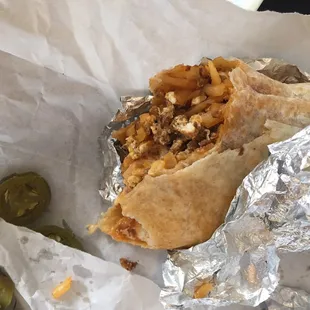 a burrito wrapped in tin foil