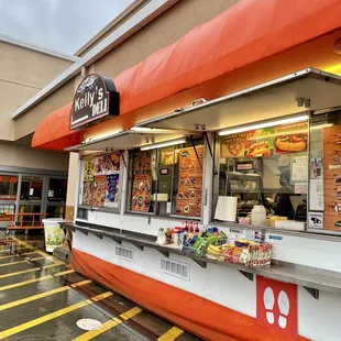 a view of the outside of a deli