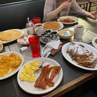 Pancakes with 2 Eggs and Bacon and a side of Hashbrowns
