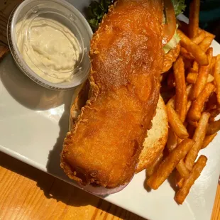 a fish sandwich and fries