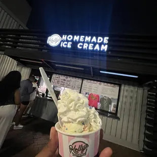 Small cup of birthday cake ice cream and (basic) whip cream