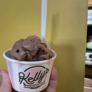 Scoop of chocolate peanut butter brownie and under a scoop of blondie