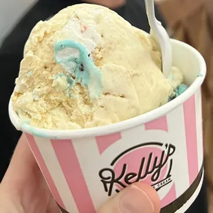 Pink and white animal cracker type flavor on top and Cookie Monster on bottom