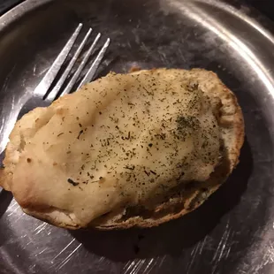 Small and lukewarm baked potato.  Skip it