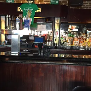 a bar with a green t - shirt