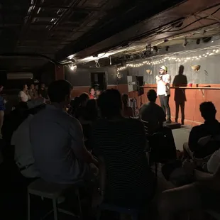a group of people sitting in a room