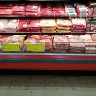 a meat section in a grocery store