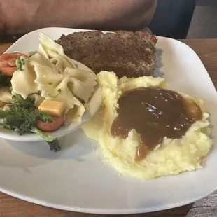 Meatloaf special with 2 sides: mashed potatoes and gravy and pine club salad.