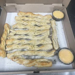 Authentic Frankie's twist bread sticks with beer cheese