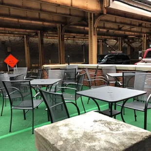 tables and chairs in an outdoor area