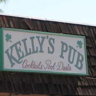 a sign for kelly&apos;s pub