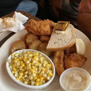 Special with a chicken breast/fish with corn and potatoes pancakes.