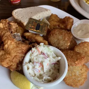 Special with a chicken breast/fish. Coleslaw and potatoes pancakes. Would order again.