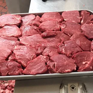 a tray of raw beef