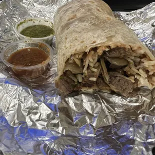 Spicy Beef Burrito With Rice &amp; Beans, green salsa is very good, full of flavor.