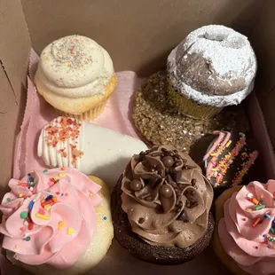 Cupcakes, cake pop, chocolate covered Oreo, oatmeal cream sandwich cookie