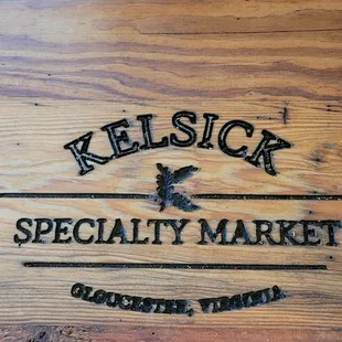 a person standing on a wooden table