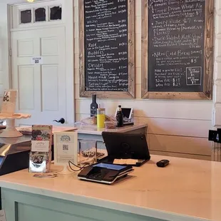 a counter with a laptop on it