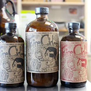 three bottles of alcohol