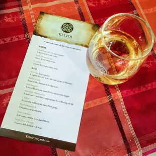 Wine list with a glass of Irish Teardrops