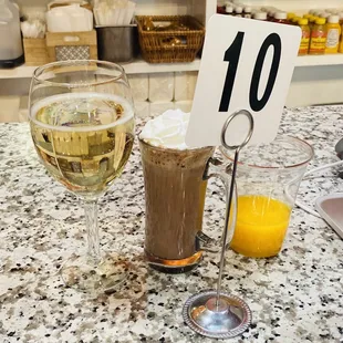 Mimosa with OJ on the side and hot chocolate.