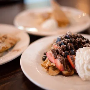 three plates of dessert