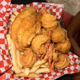 Fish, shrimp, hush puppies, and fries